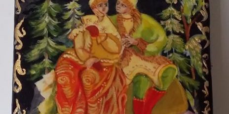 Lakdoos Man en vrouw zittend